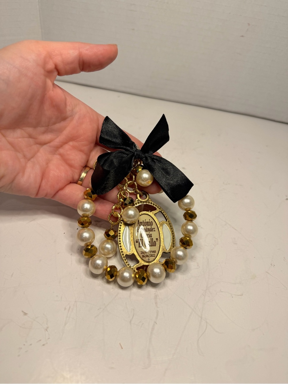 Custom Memorial Beaded Bracelet with Religious Icon Pendant and Black Bow
